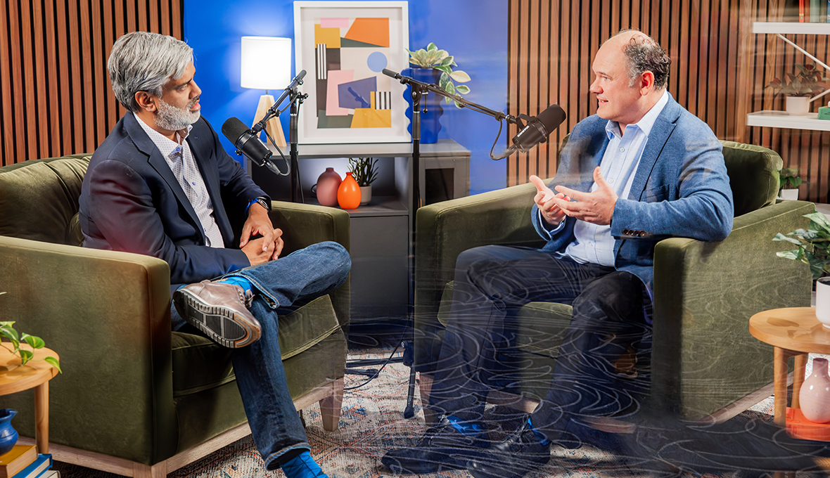 Two men talking to each other on the Executive Insight Podcast